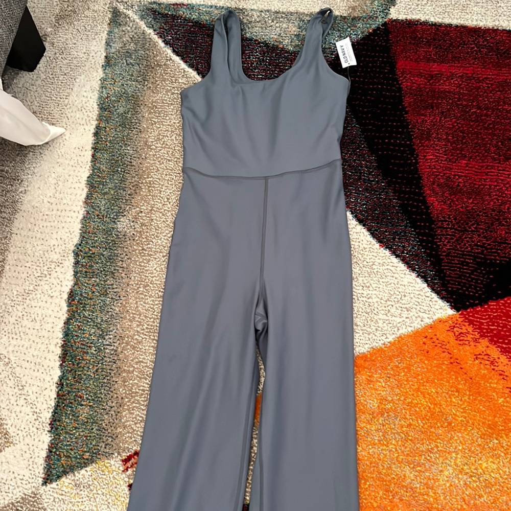 Old navy jumpsuit…flared bottom. Will look high water if you’re taller. Suit-4ft